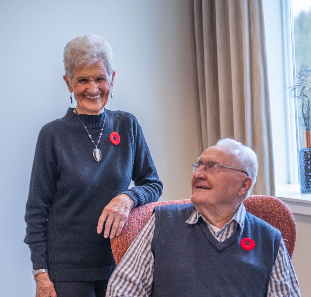 two smiling residents